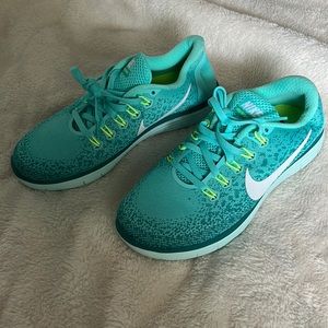 Nike Free RN Distance, size 6.5. Dark aqua-ish color